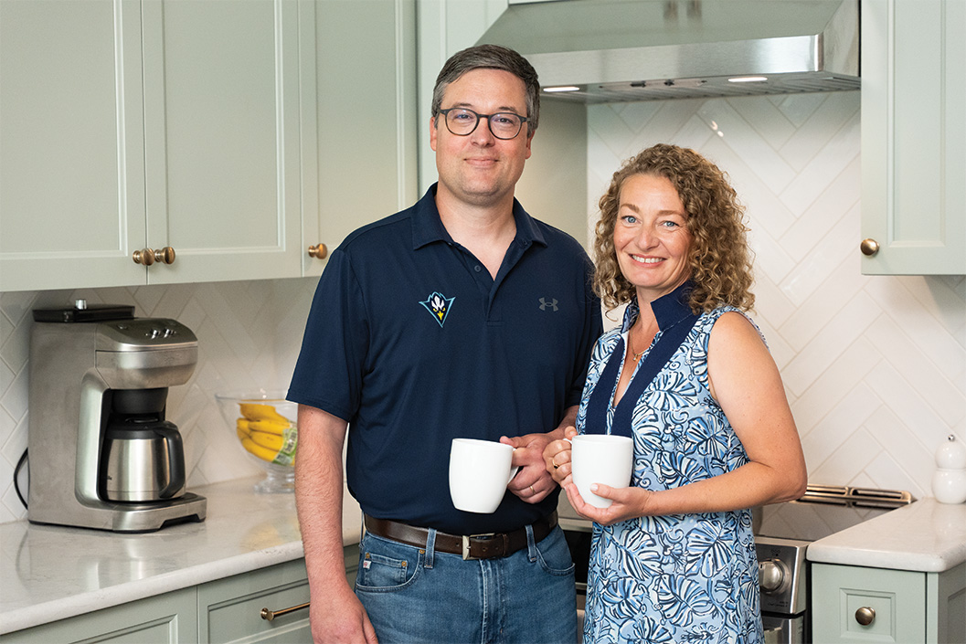 Dane Scalise and his wife with coffee in their New Hanover County kitchen